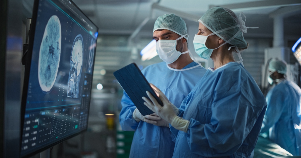 Before,Beginning,The,Surgery,,Female,Lead,Surgeon,And,An,Assistant